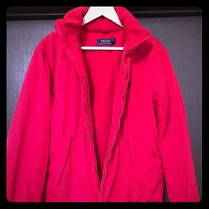 Polo zip up jacket with hide away hood